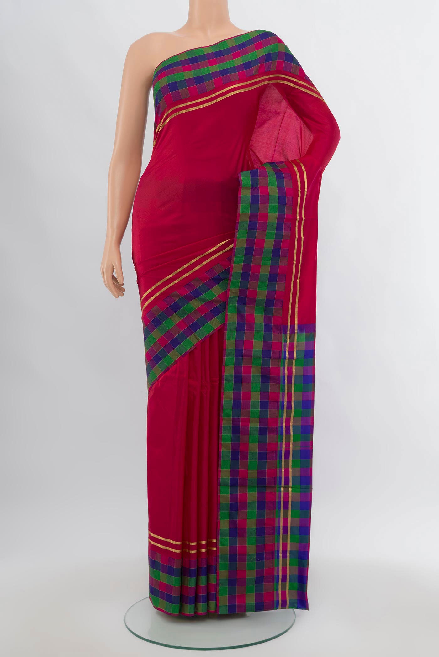 Dark Pink Pochampally Saree with Ikat Print on the body and Silk Border.  displayed on a mannequin