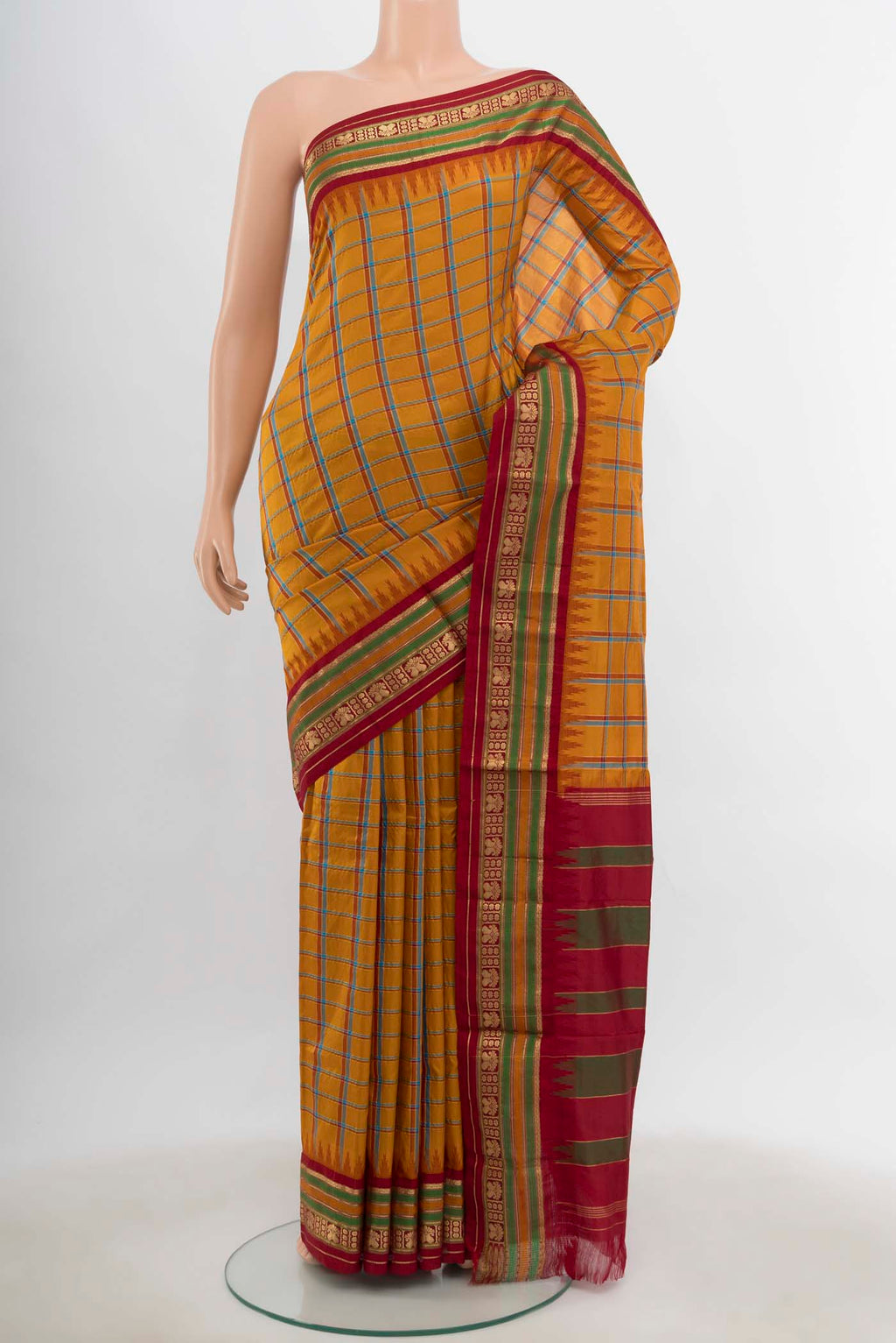 Mustard Bangalore Silk - kadyal Saree with Checked design on the body and Silk Border.  displayed on a mannequin