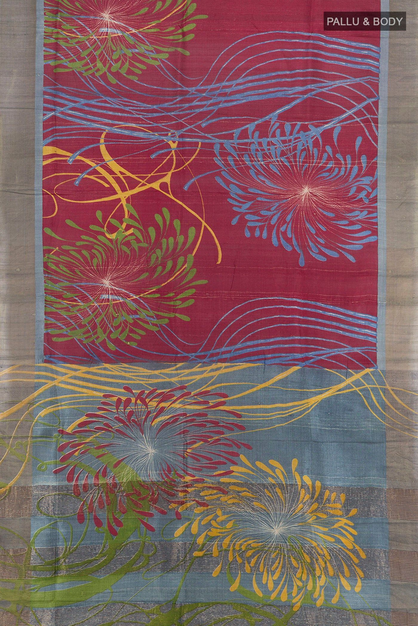 Flat view of Maroon Tussar Silk Saree with Floral Print on the body and Zari Border. 
