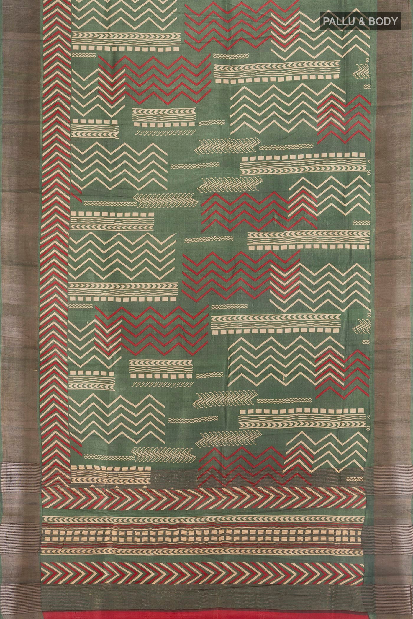 Flat view of Green Tussar Silk Saree with Floral Print on the body and Zari Border. 