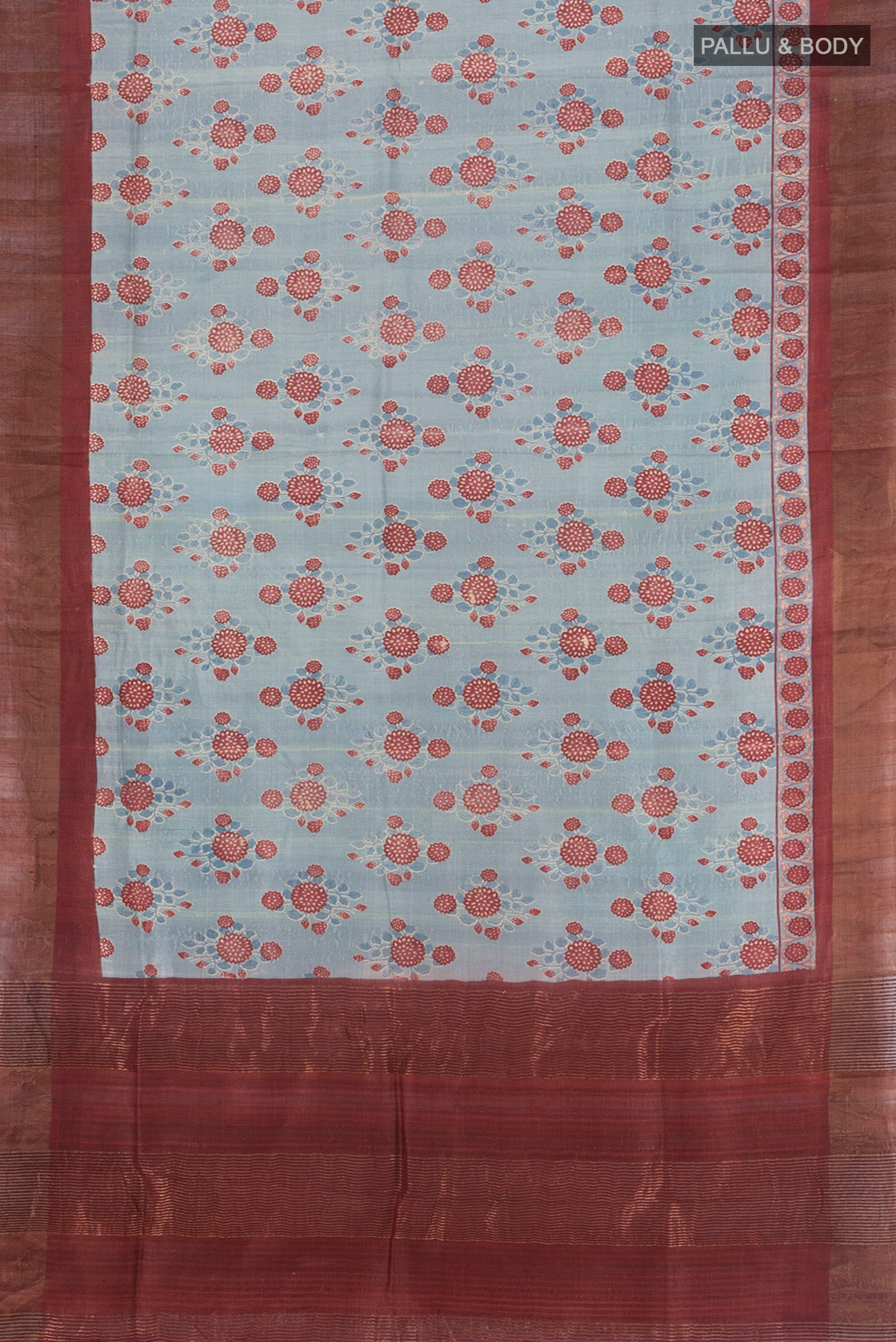 Flat view of Grey Tussar Silk Saree with Floral Print on the body and Zari Border. 