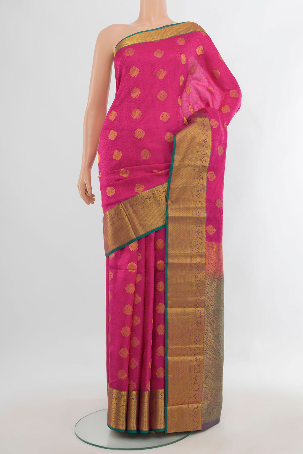 Pure Silk Pink Kanchipuram Saree with Zari Butta on the body and Zari Border.  displayed on a mannequin