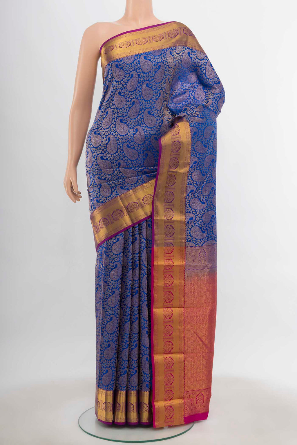 Dark Blue Kanchipuram Silk Saree with Zari Butta on the body and Silk Border.  displayed on a mannequin
