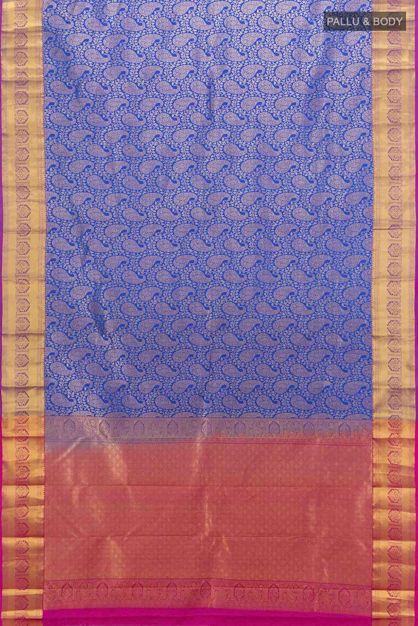 Flat view of Dark Blue Kanchipuram Silk Saree with Zari Butta on the body and Silk Border. 