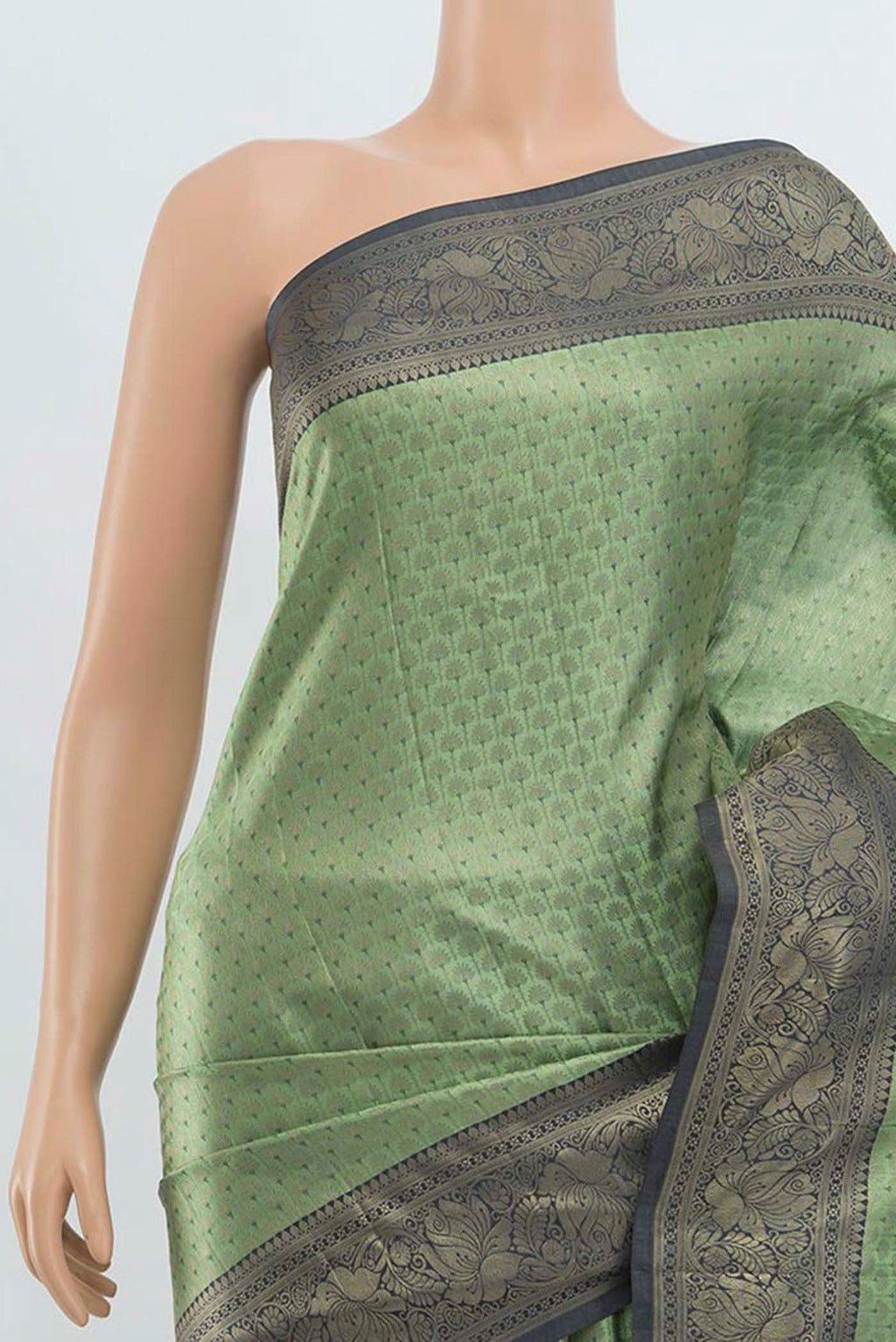 Border image of Light Green Kanchipuram Silk Saree with Zari Butta on the body and Silk Border. 