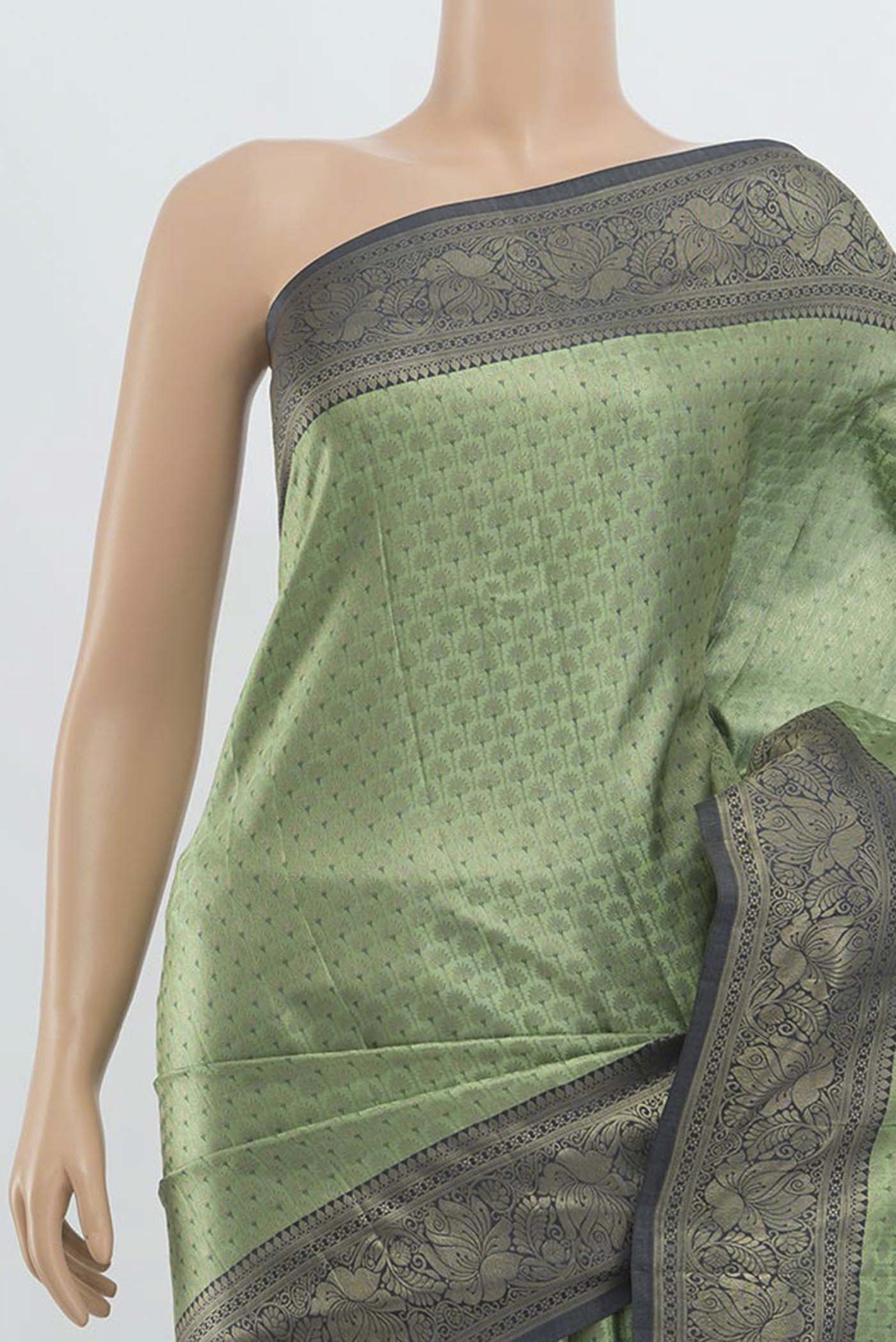 Border image of Light Green Kanchipuram Silk Saree with Zari Butta on the body and Silk Border. 