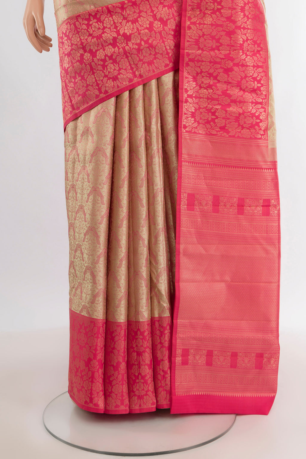 Pleats and pallu of Rose Gold Kanchipuram Tissue Silk Saree with Zari Brocade on the body and Zari Border. 