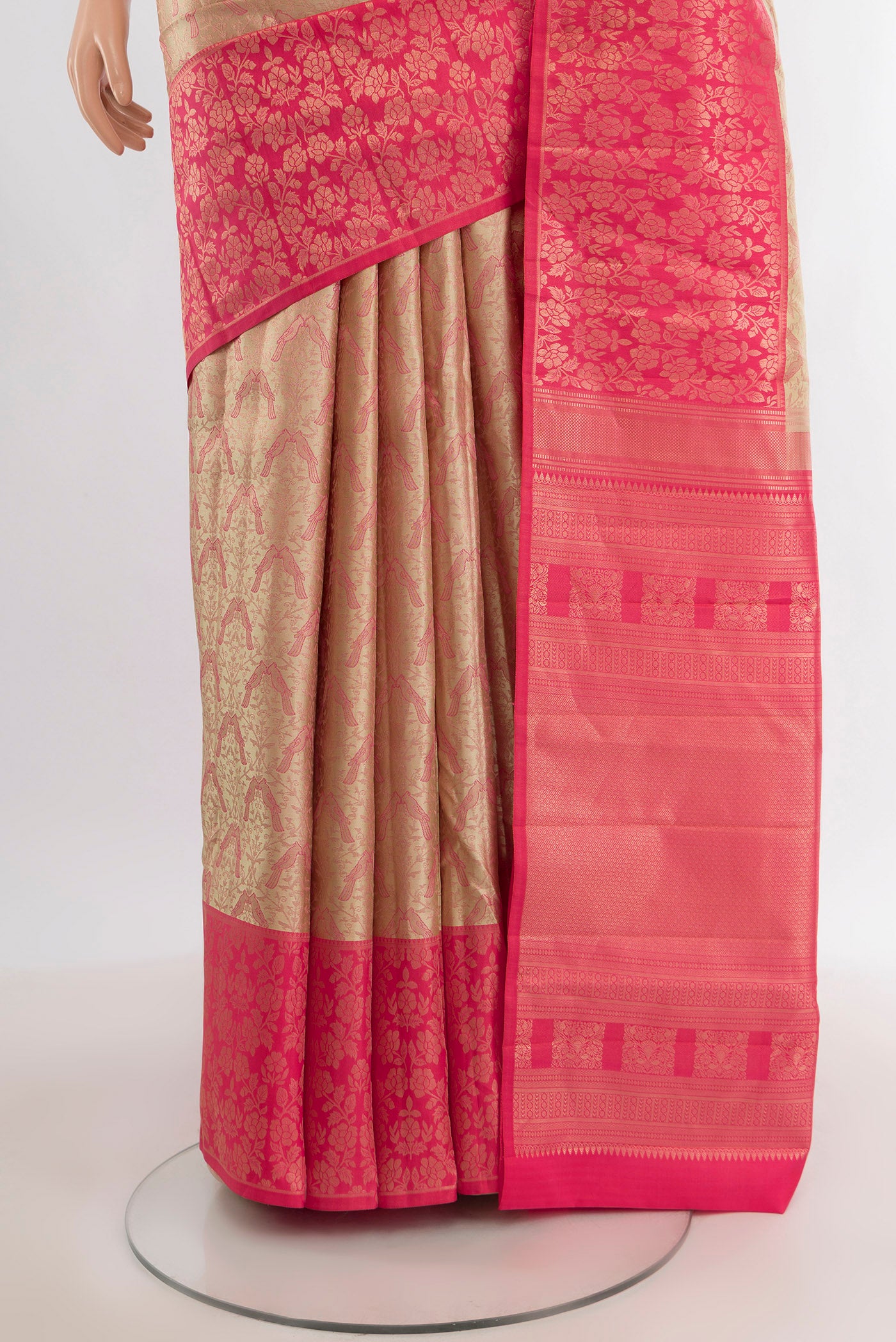 Pleats and pallu of Rose Gold Kanchipuram Tissue Silk Saree with Zari Brocade on the body and Zari Border. 