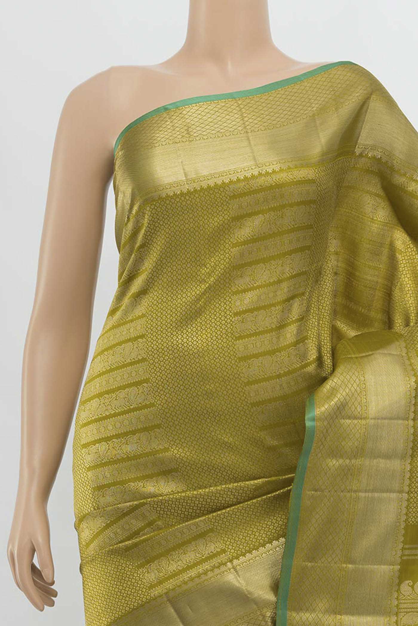Border image of Mehandi Green Kanchipuram Silk Saree with Zari Butta on the body and Silk Border. 