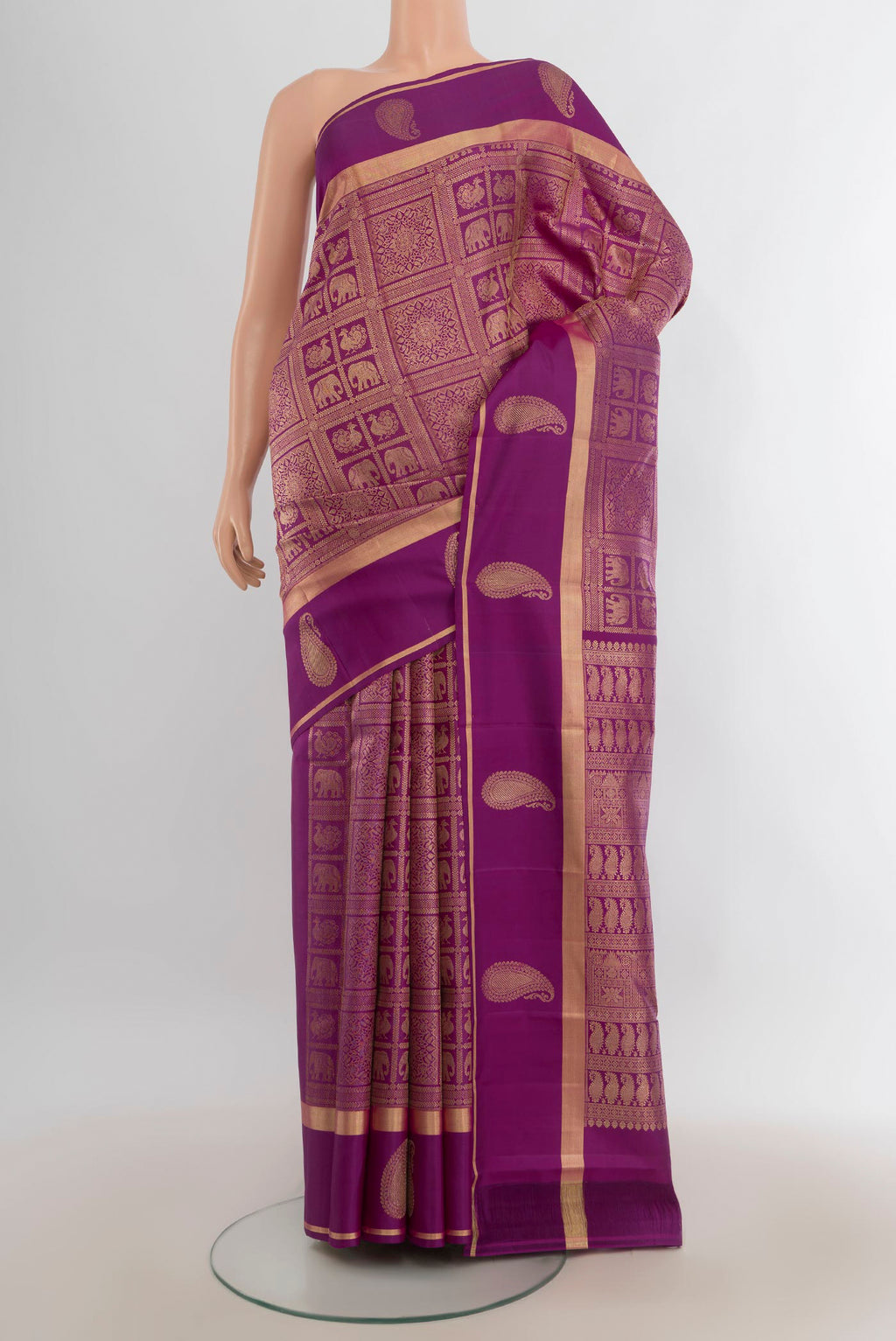 Pure Silk Violet Kanchipuram Saree with Zari Butta on the body and Silk Border.  displayed on a mannequin