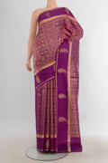 Pure Silk Violet Kanchipuram Saree with Zari Butta on the body and Silk Border.  displayed on a mannequin