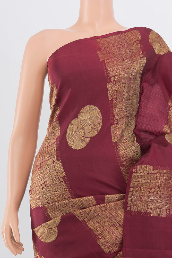 Border image of Pure Silk Pure Zari Maroon Kanchipuram Saree with Zari Butta on the body and Silk Border. 