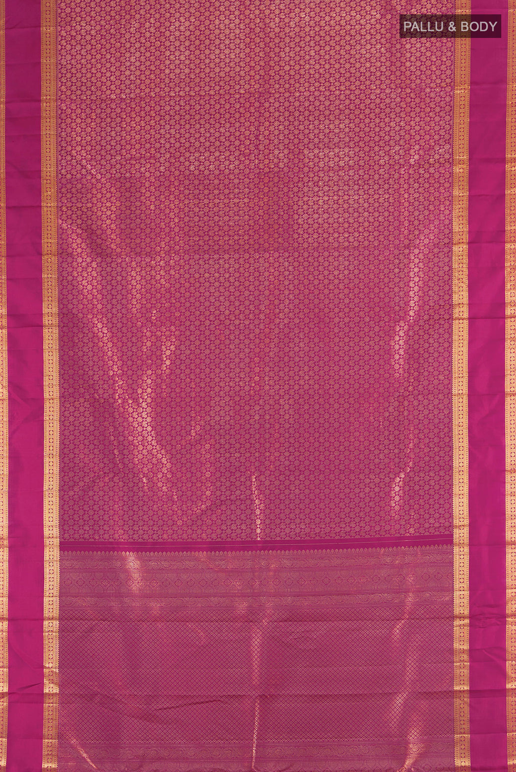 Flat view of Magenta Kanchipuram Silk Saree with Zari Brocade on the body and Zari Border. 