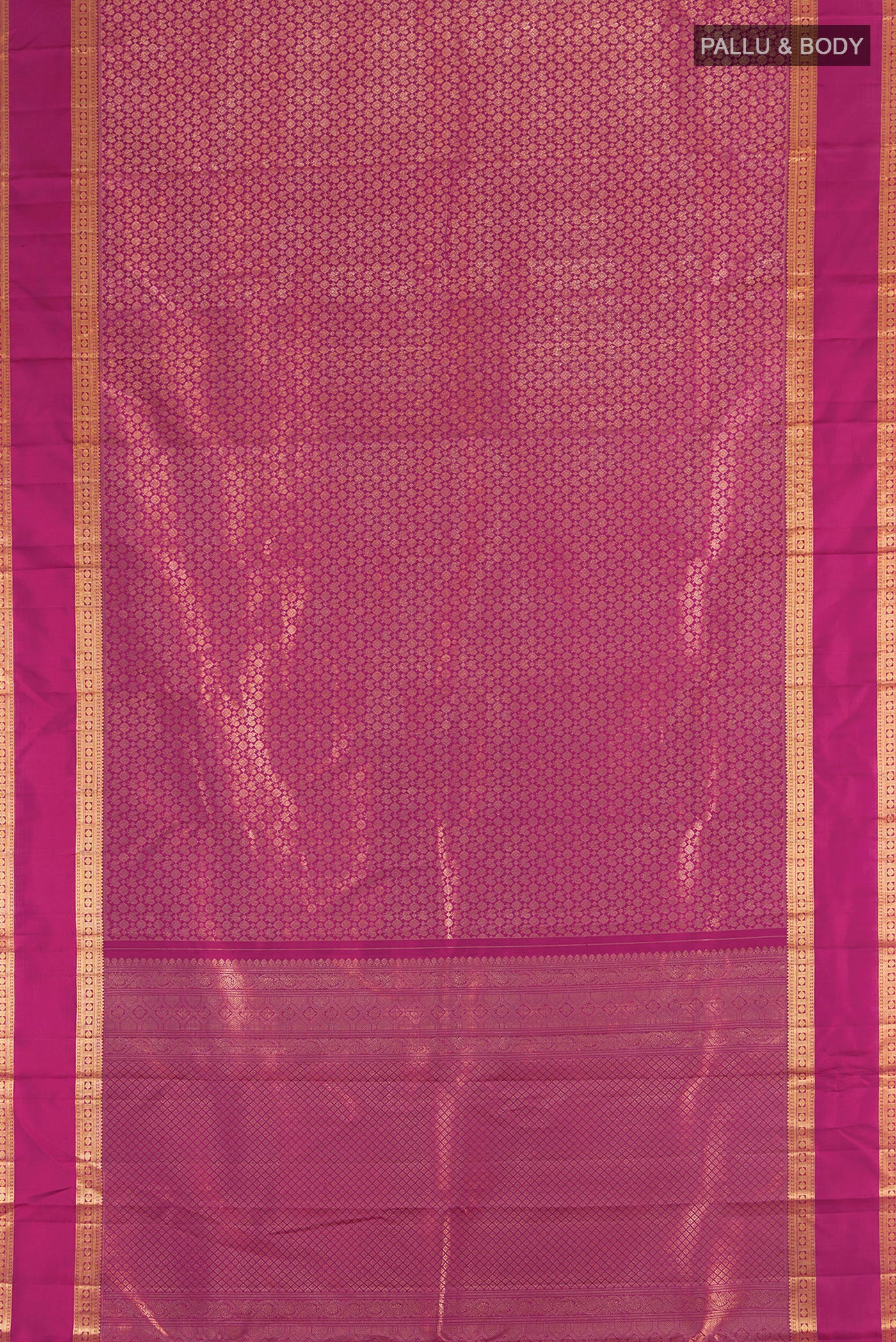 Flat view of Magenta Kanchipuram Silk Saree with Zari Brocade on the body and Zari Border. 