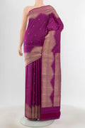 Pure Silk Pure Zari Purple Kanjivaram Saree with Zari Butta on the body and Silk Border.  displayed on a mannequin