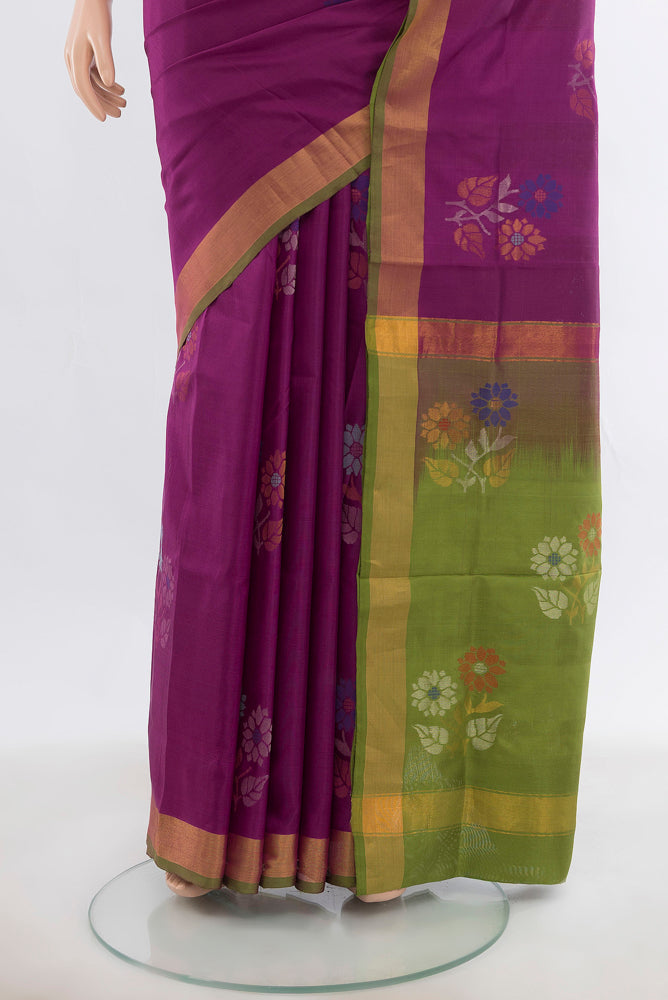 Pleats and pallu of Purple Uppada Silk Saree with Zari Butta on the body and Silk Border. 