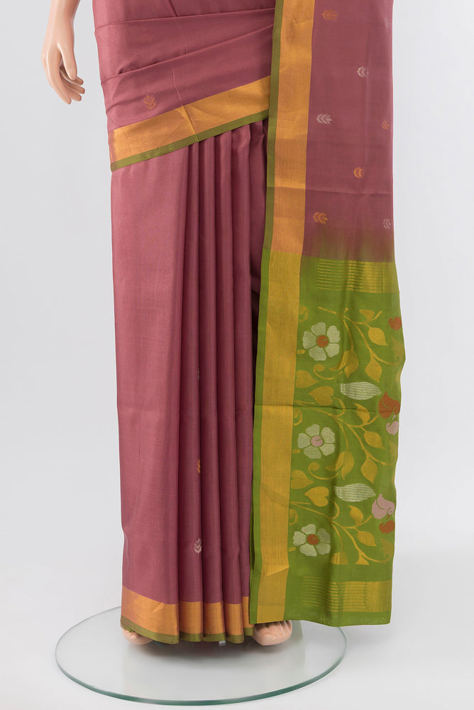 Pleats and pallu of Pure Silk Pure Zari Bronze Soft Saree with Zari Butta on the body and Silk Border. 