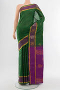 Mint Green Uppada Silk Saree with Zari Butta on the body and Silk Border.  displayed on a mannequin