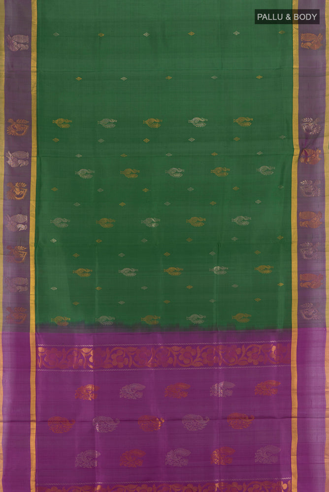 Flat view of Mint Green Uppada Silk Saree with Zari Butta on the body and Silk Border. 