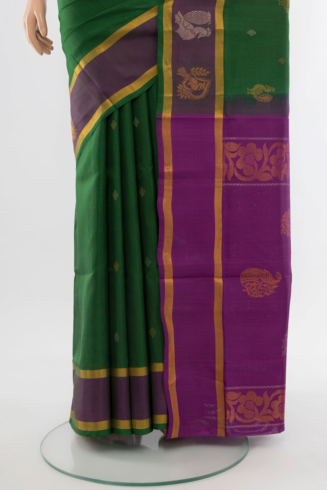 Pleats and pallu of Mint Green Uppada Silk Saree with Zari Butta on the body and Silk Border. 