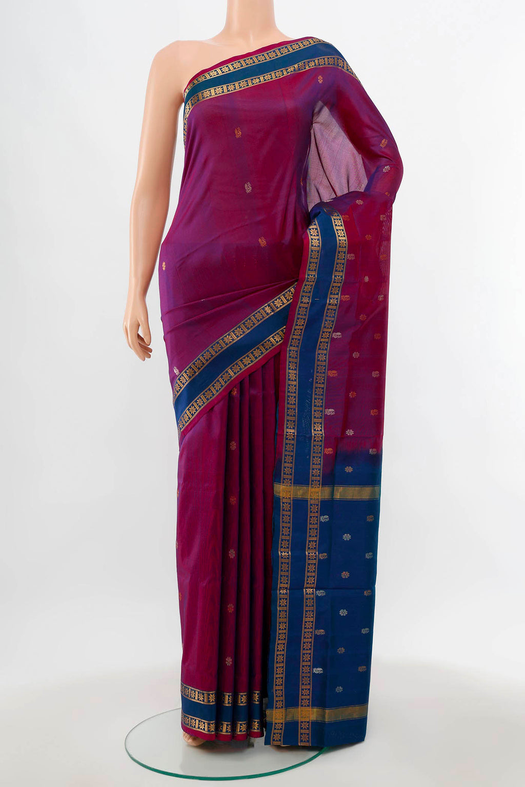 Purple Uppada Silk Saree with Zari Butta on the body and Silk Border.  displayed on a mannequin