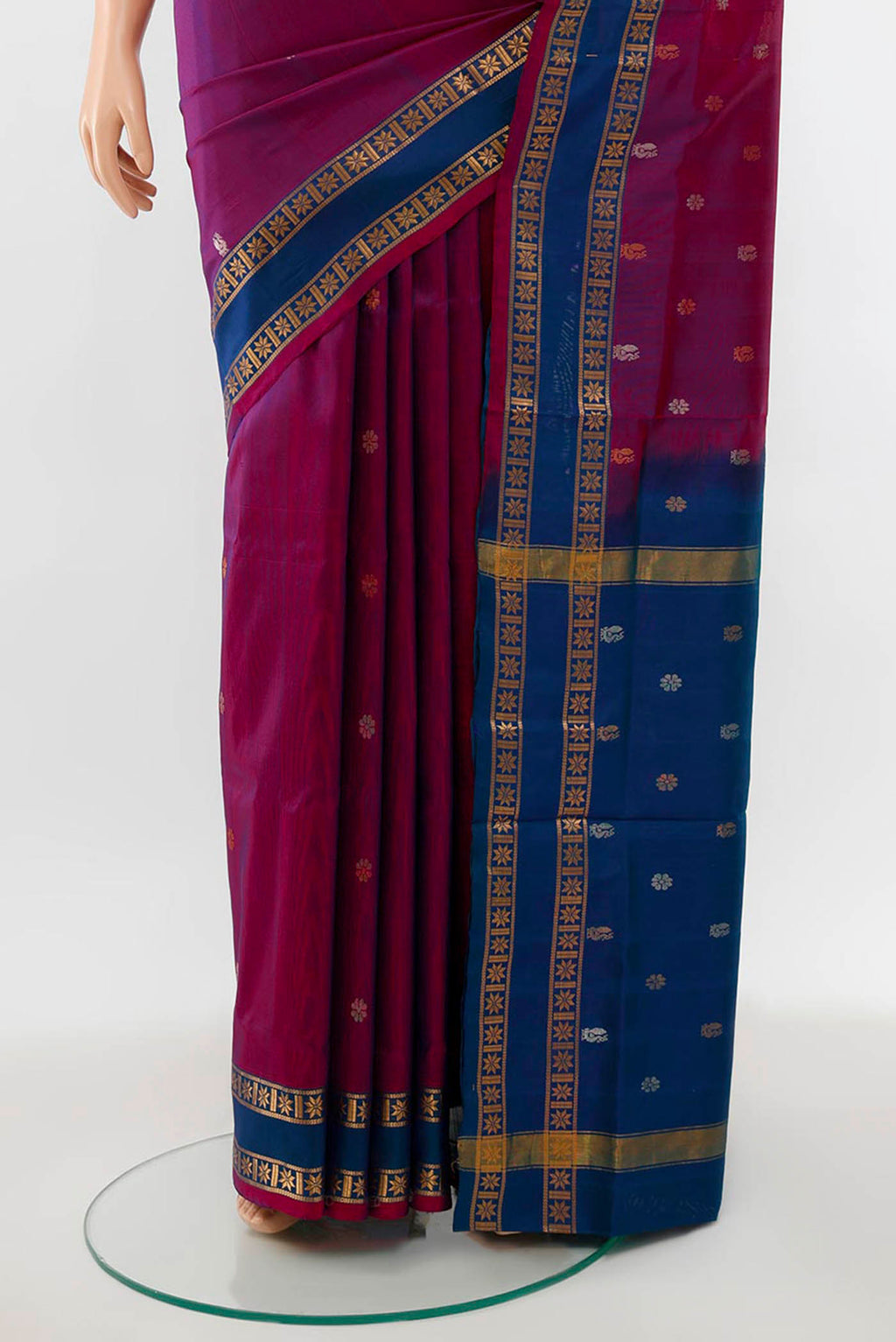 Pleats and pallu of Purple Uppada Silk Saree with Zari Butta on the body and Silk Border. 