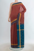 Pure Silk Brown Uppada Saree with Zari Butta on the body and Zari Border.  displayed on a mannequin