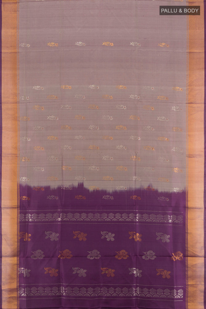 Flat view of Bronze Uppada Silk Saree with Zari Butta on the body and Silk Border. 
