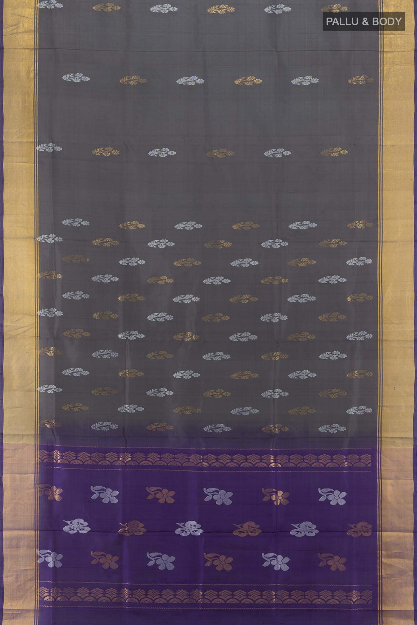 Flat view of Grey Uppada Silk Saree with Zari Butta on the body and Silk Border. 