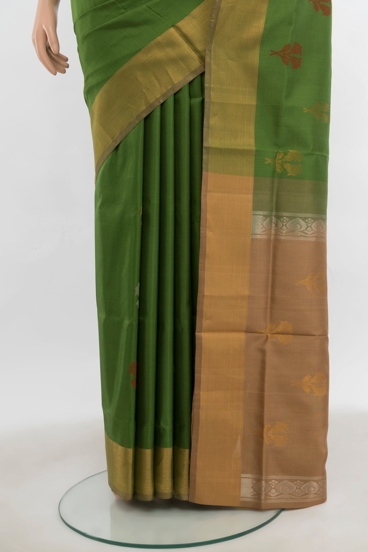 Pleats and pallu of Light Green Uppada Silk Saree with Zari Butta on the body and Silk Border. 