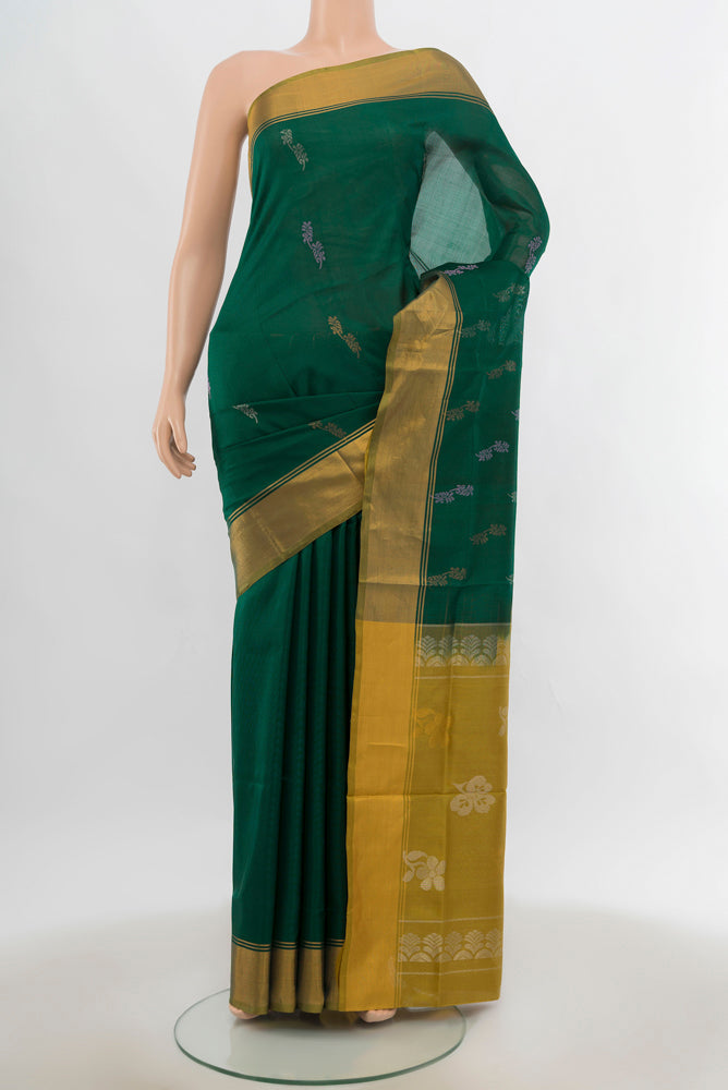 Dark Blue Uppada Silk Saree with Zari Butta on the body and Silk Border.  displayed on a mannequin