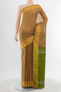 Beige Uppada Silk Saree with Zari Butta on the body and Silk Border.  displayed on a mannequin