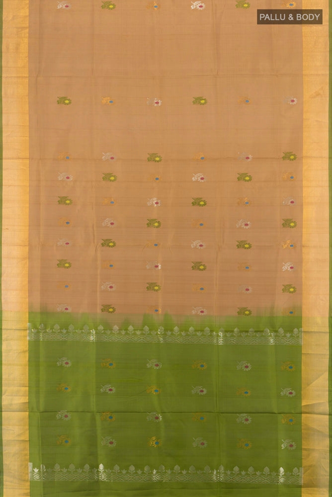 Flat view of Beige Uppada Silk Saree with Zari Butta on the body and Silk Border. 