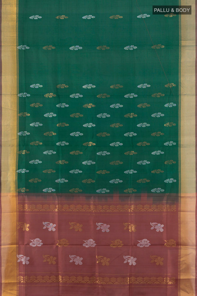 Flat view of Mint Green Uppada Silk Saree with Zari Butta on the body and Silk Border. 