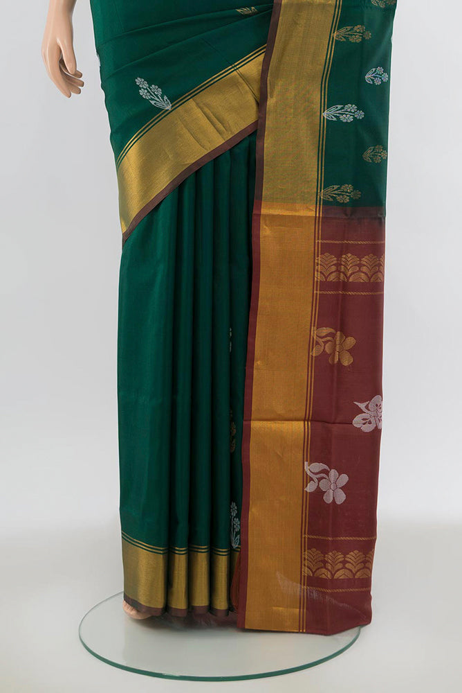 Pleats and pallu of Mint Green Uppada Silk Saree with Zari Butta on the body and Silk Border. 