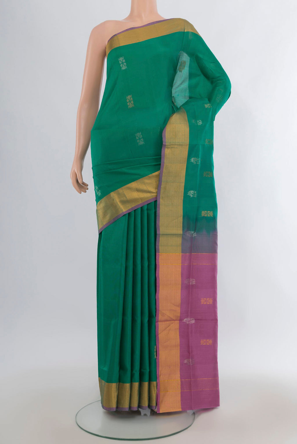 Pure Silk Green Uppada Saree with Zari Butta on the body and Zari Border.  displayed on a mannequin