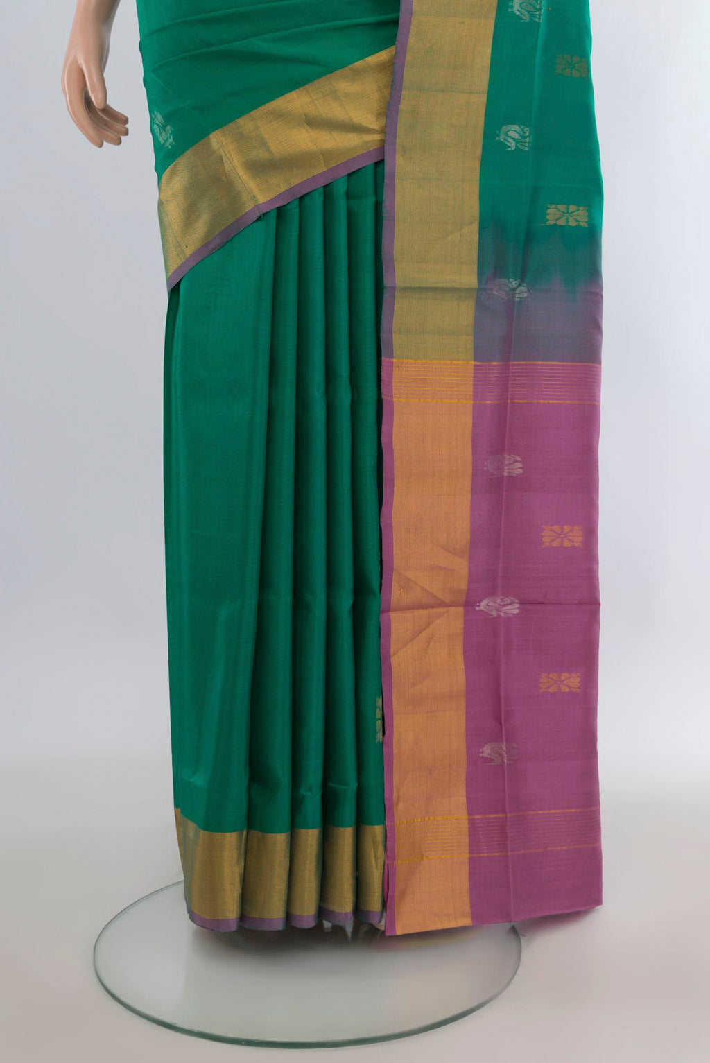 Pleats and pallu of Pure Silk Green Uppada Saree with Zari Butta on the body and Zari Border. 