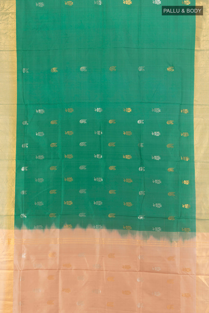 Flat view of Mint Green Uppada Silk Saree with Zari Butta on the body and Silk Border. 