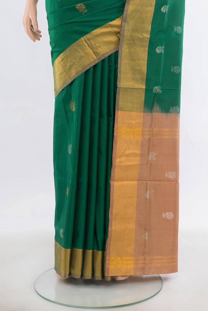 Pleats and pallu of Mint Green Uppada Silk Saree with Zari Butta on the body and Silk Border. 