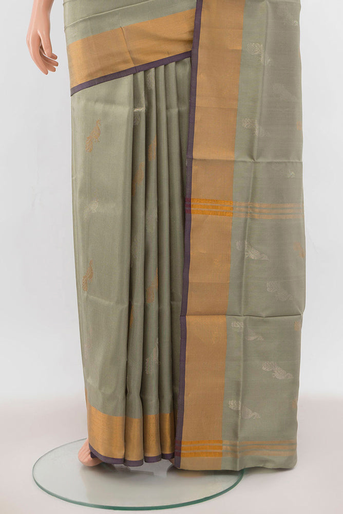 Pleats and pallu of Davys Grey Uppada Silk Saree with Zari Butta on the body and Silk Border. 