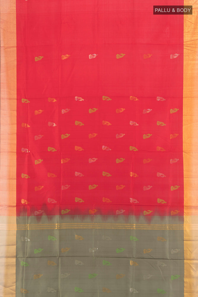 Flat view of Pure Silk Pure Zari Red Soft Saree with Zari Butta on the body and Silk Border. 