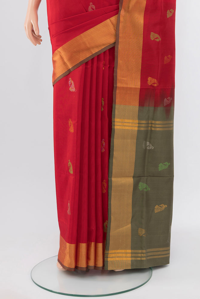 Pleats and pallu of Pure Silk Pure Zari Red Soft Saree with Zari Butta on the body and Silk Border. 