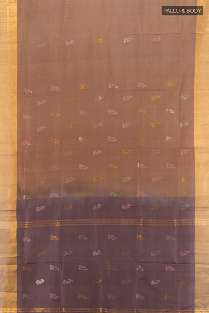 Flat view of Brown Uppada Silk Saree with Zari Butta on the body and Silk Border. 
