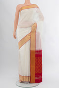 Off White Uppada Silk Saree with Zari Butta on the body and Silk Border.  displayed on a mannequin