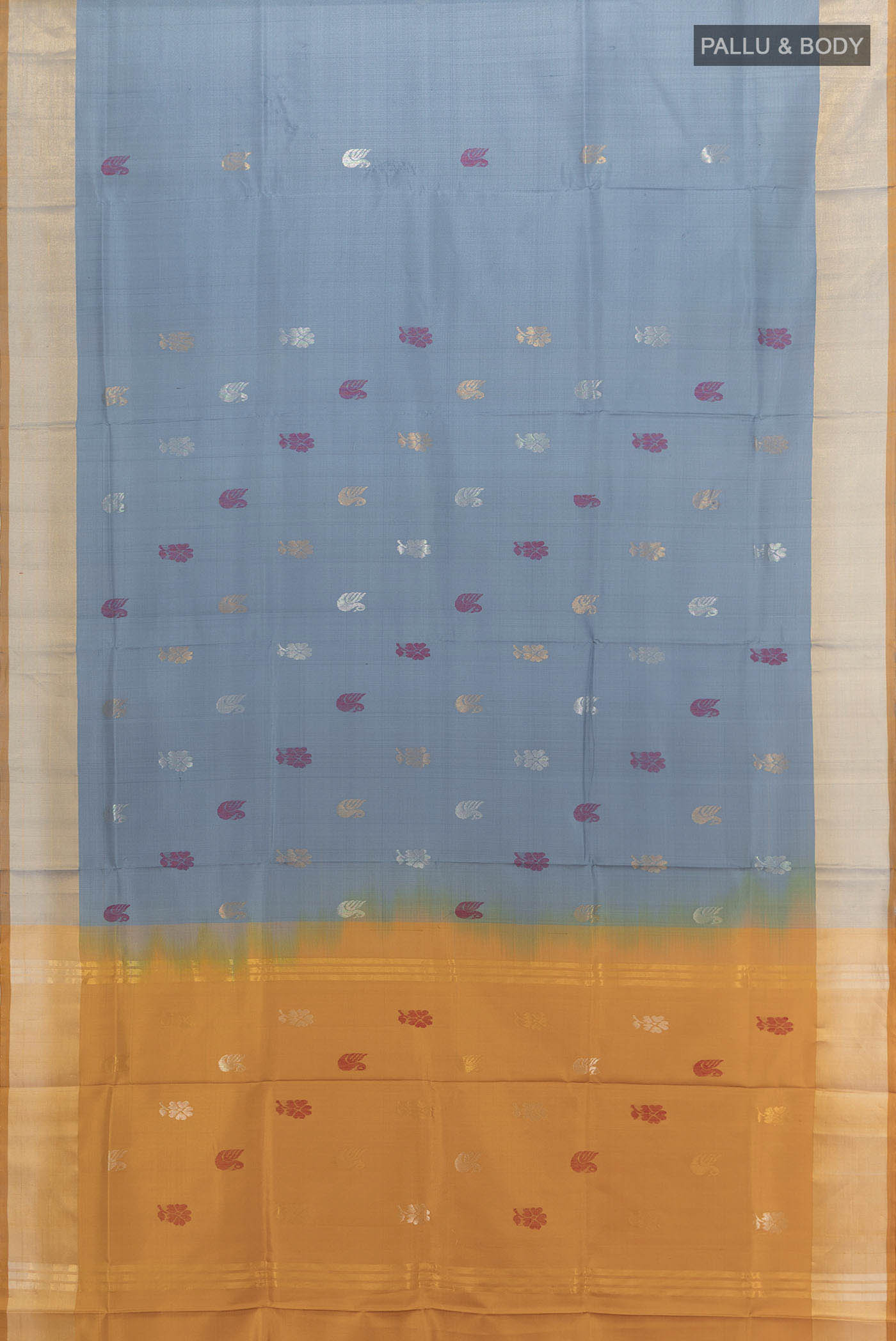 Flat view of Grey Uppada Silk Saree with Zari Butta on the body and Silk Border. 