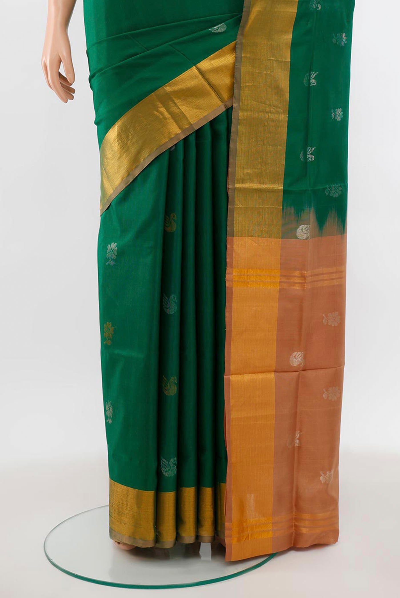 Pleats and pallu of Light Green Uppada Silk Saree with Zari Butta on the body and Silk Border. 