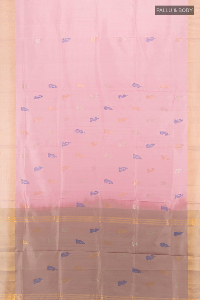 Flat view of Rose pink Uppada Silk Saree with Zari Butta on the body and Silk Border. 