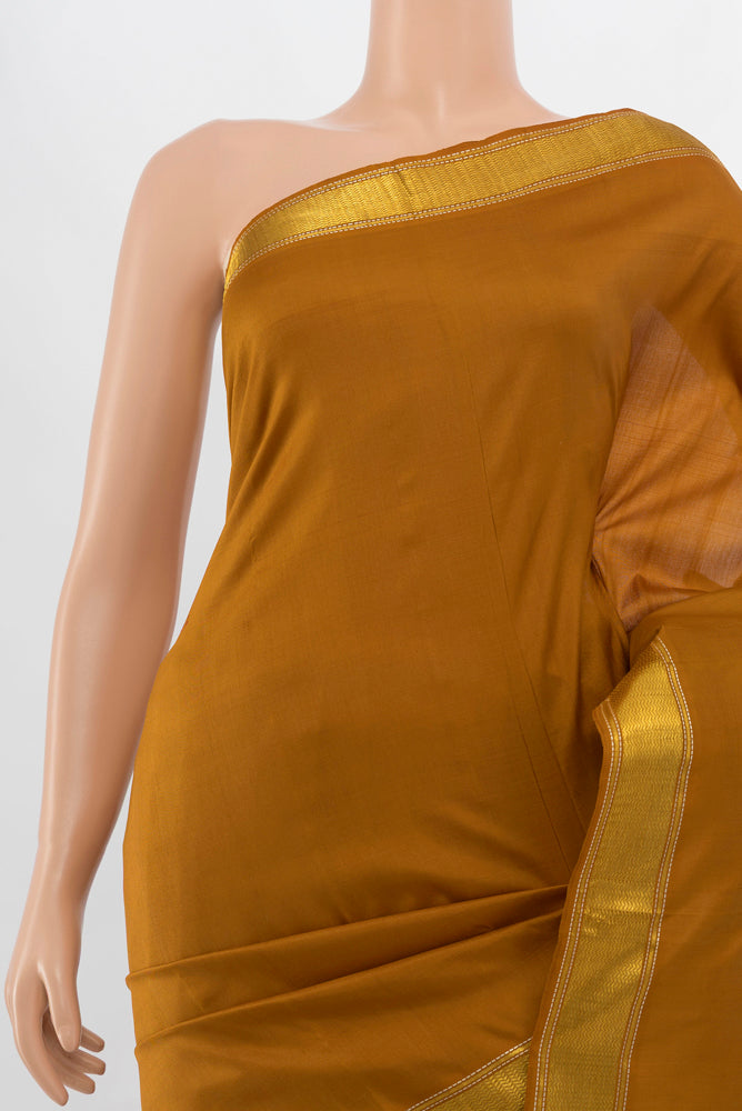 Border image of Brown Kanjivaram Silk Saree with Plain Body and Silk Border. 