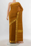 Brown Kanjivaram Silk Saree with Plain Body and Silk Border.  displayed on a mannequin