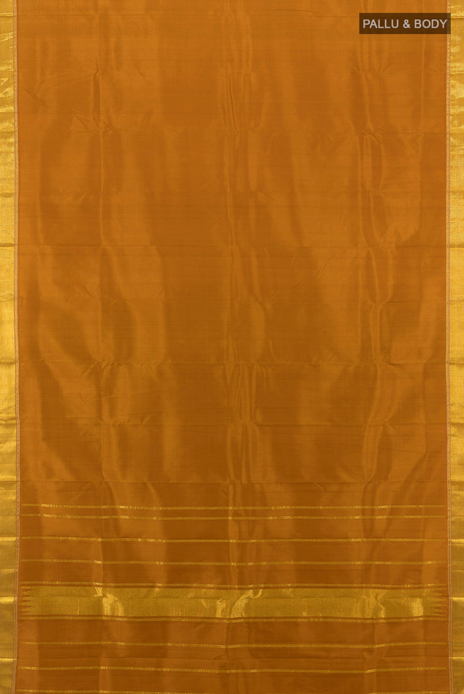 Flat view of Brown Kanjivaram Silk Saree with Plain Body and Silk Border. 
